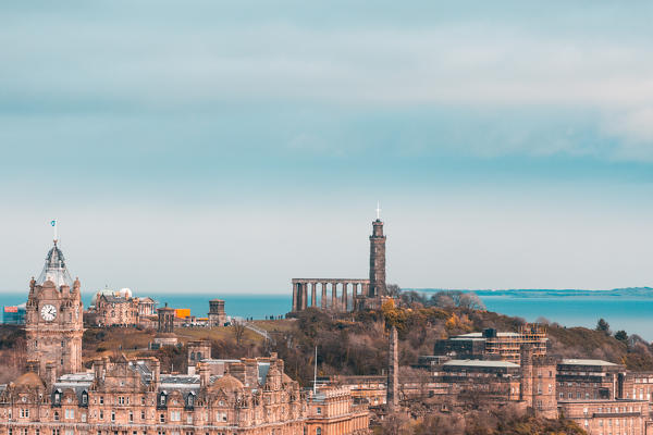 Balmoral Tower Clock and Calton Hill as seen from the boundary walls of the Edinburgh Castle - Scotland, UK  