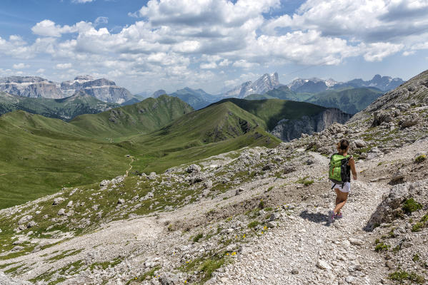 Italy, Trentino Alto Adige, Val di Fassa, Hiker on his way to the Dona Val from the Antermoia refuge.