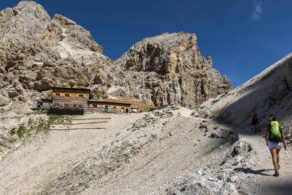 Italy, Trentino Alto Adige, Val di Fassa, Hiker on his way to the Principe mountain hut