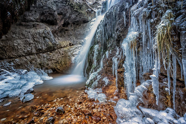 Koflertal waterfall in winter, Non Valley, Trentino Alto Adige, Italy