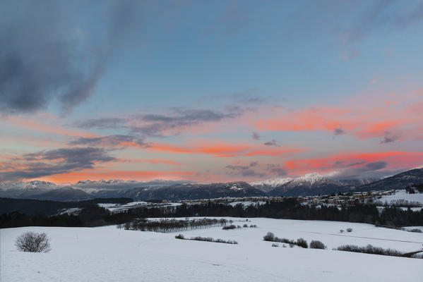 Italy;Trentino Alto Adige;Non valley, sunrise on Romeno Village and Maddalene group in a winter day.
