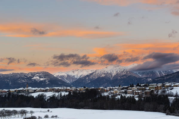 Italy;Trentino Alto Adige;Non valley, sunrise on Romeno Village and Maddalene group in a winter day.