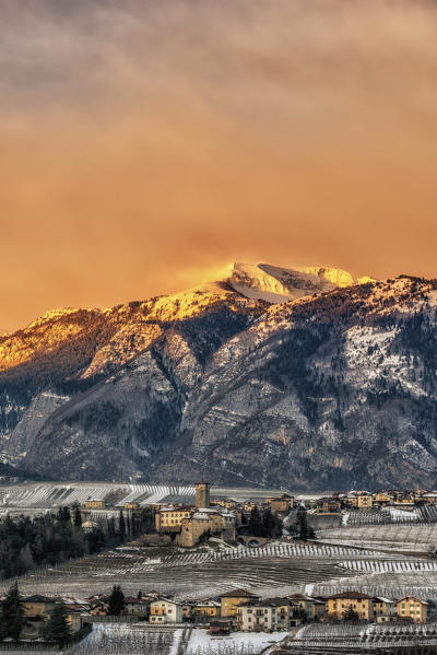 Italy, Trentino Alto Adige, Non valley, Valer Castel at dawn in a cold winter day, Peller Mount in the background