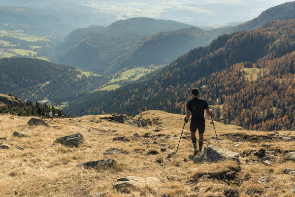 Italy, Trentino Alto Adige, Non valley, hiker on Luco Mount in autumn day.