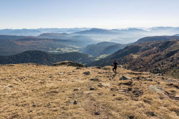 Italy, Trentino Alto Adige, Non valley, hiker on Luco Mount in autumn day.
