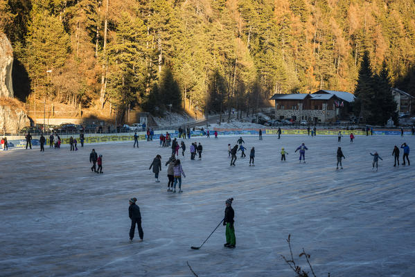 Skating at Smeraldo Lake, Fondo, Non Valley, Trentino Alto Adige, Italy.