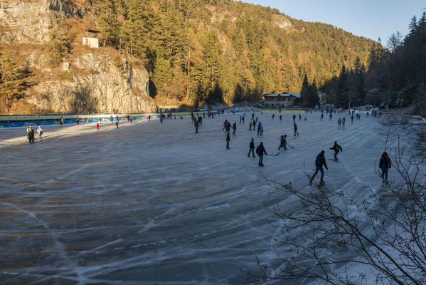 Skating at Smeraldo Lake, Fondo, Non Valley, Trentino Alto Adige, Italy.
