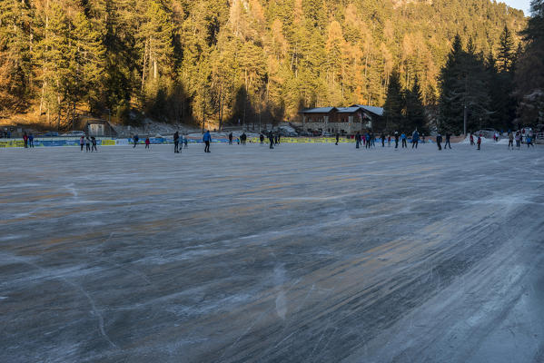 Skating at Smeraldo Lake, Fondo, Non Valley, Trentino Alto Adige, Italy.