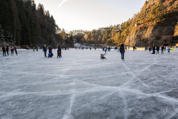 Skating at Smeraldo Lake, Fondo, Non Valley, Trentino Alto Adige, Italy.