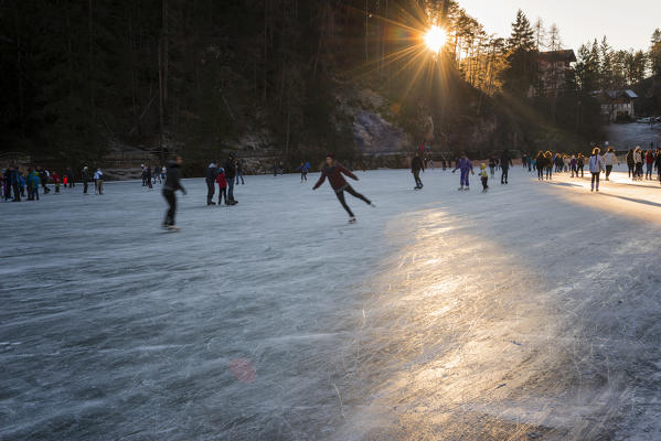 Skating at Smeraldo Lake, Fondo, Non Valley, Trentino Alto Adige, Italy.