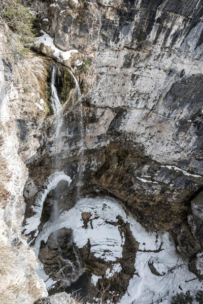 Aereal view from frozen waterfall from Tret city, Non Valley, Trentino Alto Adige, Italy.