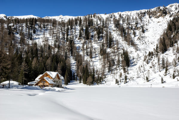 Italy, Trentino Alto Adige, Madonna di campiglio, natural park Adamello Brenta, Nambino refuge in a winter day.