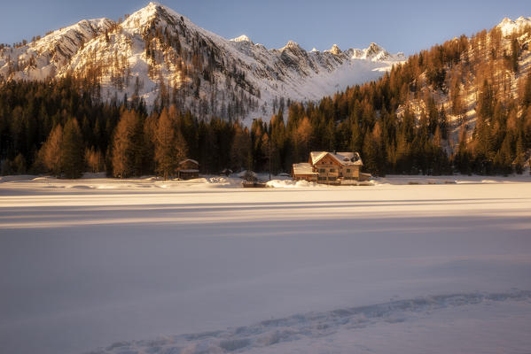 Sunrise on Nambino's lake, Madonna di Campiglio, Trentino, Italy, Europe.