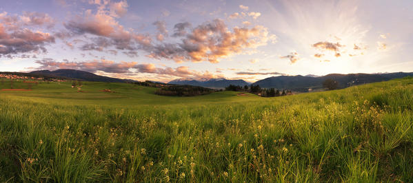 Italy, Trentino Alto Adige, sunset on the prairies of Non valley on a spring day.