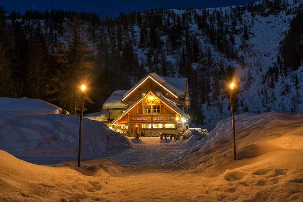 Italy, Trentino Alto Adige, starry night over Nambino refuge in natural park Adamello Brenta.