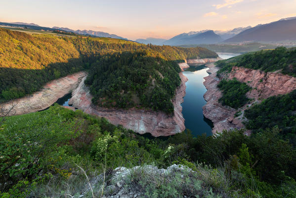 Italy, Trentino Alto Adige, sunset on the St. Giustina lake canyon in Non Valley.