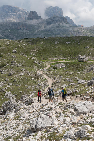 Europe, Italy, Dolomites, province of Bolzano. Tre Cime di Lavaredo. Hikers towards Locatelli refuge.