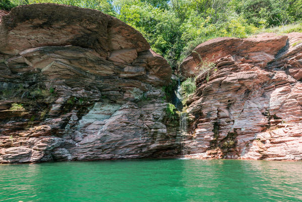 waterfall that empties into St. Giustina Lake, Non valley, Trento province, Trentino South Tyrol, Italy, Europe