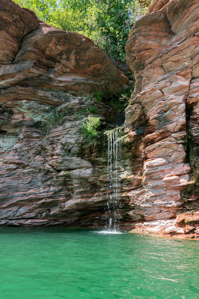waterfall that empties into St. Giustina Lake, Non valley, Trento province, Trentino South Tyrol, Italy, Europe
