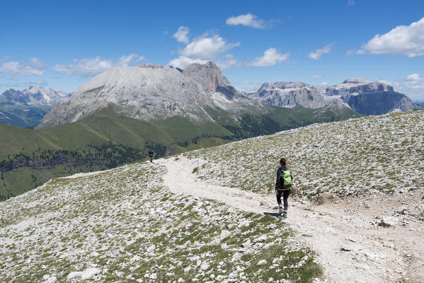 Italy, dolomites, Trentino South Tyrol, fassa valley, Hiker on his way to the Dona Val from the Antermoia refuge.