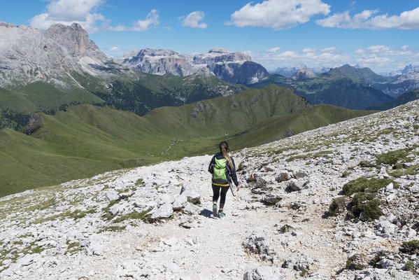Italy, dolomites, Trentino South Tyrol, fassa valley, Hiker on his way to the Dona Val from the Antermoia refuge.