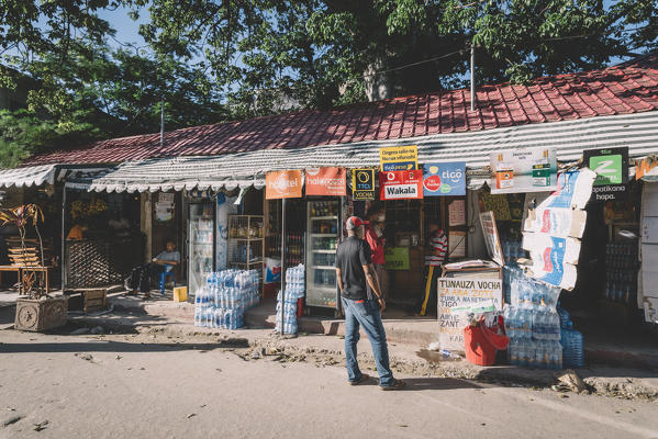 East Africa, Tanzania, Zanzibar, street with shops of stone town.
