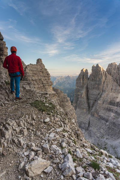 Sesto/Sexten, Dolomites, South Tyrol, province of Bolzano, Italy. Climber on the via ferrata 
