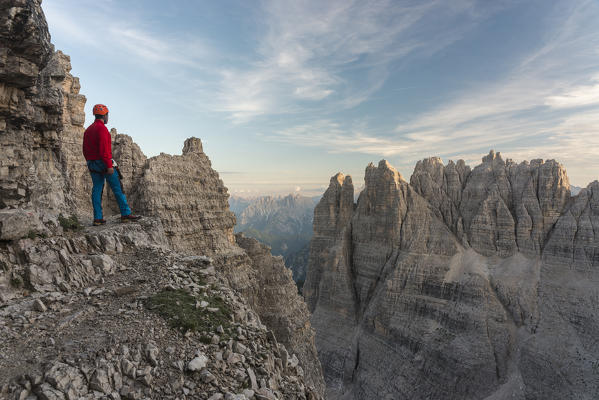 Sesto/Sexten, Dolomites, South Tyrol, province of Bolzano, Italy. Climber on the via ferrata 