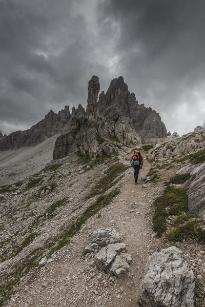 Sesto/Sexten, Dolomites, South Tyrol, province of Bolzano, Italy. Climber on the via ferrata 