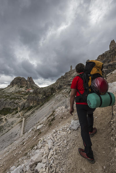 Sesto/Sexten, Dolomites, South Tyrol, province of Bolzano, Italy. Climber on the via ferrata 