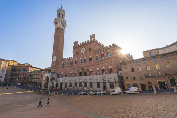 Siena, Tuscany, Italy, Europe. View of Piazza del Campo with the historical Palazzo Pubblico and its Torre del Mangia.