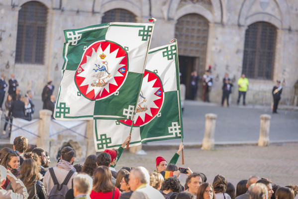 Typical exhibition of traditional clothes and flags of the different contradas Piazza del Campo Siena Tuscany Italy Europe