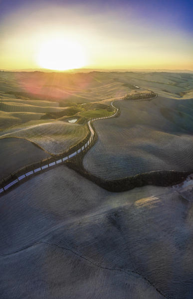Podere Baccoleno, Asciano, Crete senesi, Tuscany, Italy. Aerial view of the iconic Podere Baccoleno