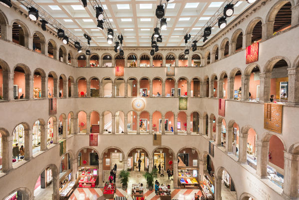 Inside view of the luxury shopping center Fondaco dei Tedeschi in Venice, Veneto, Italy