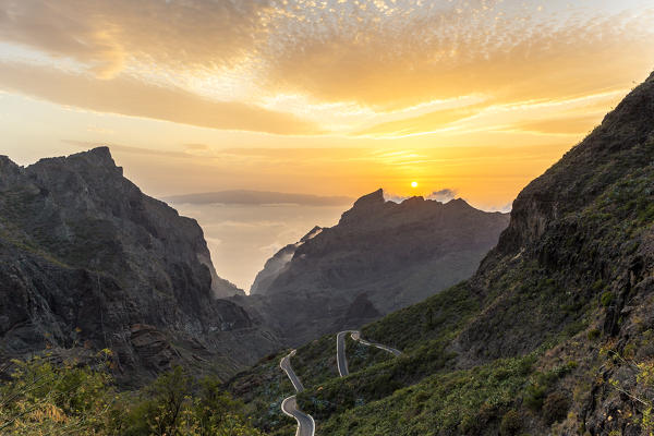 Spain,Canary Islands,Tenerife,Teno massif and in the background the island of La Gomera at sunset