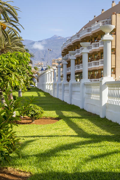 Spain,Canary Islands,Tenerife,Santa Cruz de Tenerife,Calle las Piramides and Peak of Teide in the background