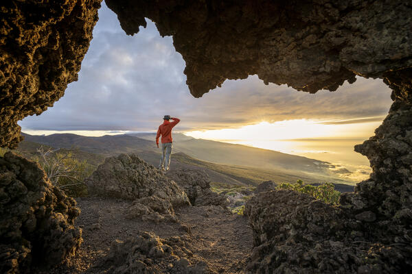 Spain, Canary Islands, Tenerife, Teide National Park, hiker admires the sunset on Teide (MR)