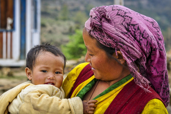 Little baby with her mom,Rasuwa district, Bagmati region,Nepal,Asia