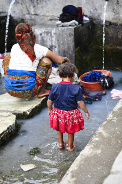 Do the laundry, Ghandruk village, Annapurna region,Nepal, Asia