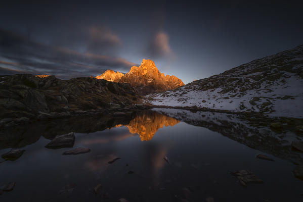 Europe, Italy, Trentino Alto Adige, Rolle pass, Dolomites, Cimon della Pala.
Reflected in the lakes of Cavallazza at sunset