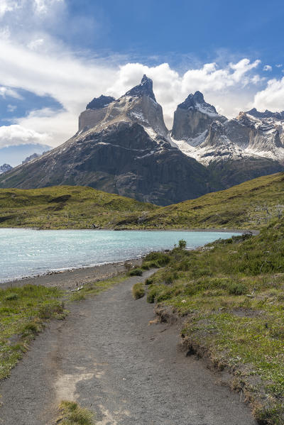 The trail that leads to Mirador Cuernos, with Nordenskjold Lake and Paine Horns, in summer. Torres del Paine National Park, Ultima Esperanza province, Magallanes region, Chile.