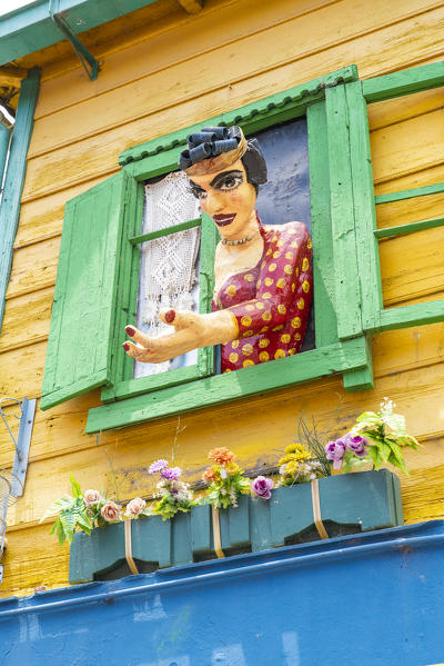 Relief of woman at window. El Caminito Street, La Boca district, Buenos Aires, Argentina.