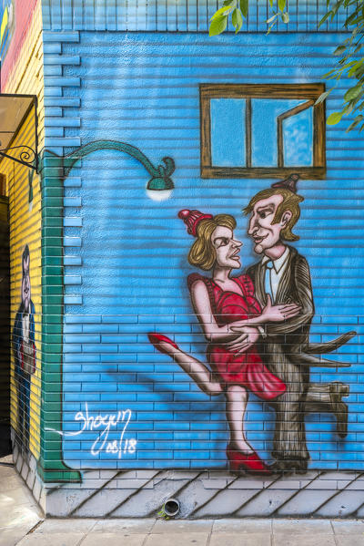 Painting of a couple tango dancing. El Caminito Street, La Boca district, Buenos Aires, Argentina.