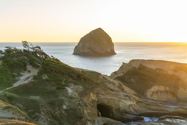 Haystack Rock at Cape Kiwanda at sunset. Pacific City, Tillamook county, Oregon, USA.