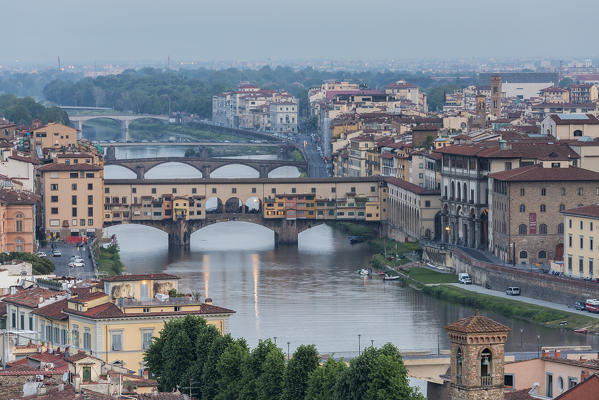 The historical Ponte Vecchio and Arno RIver at dawn in Florence, Tuscany, Italy.