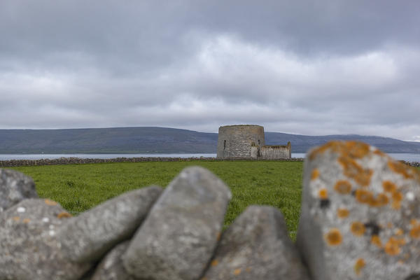 Ruins of Martello tower and barracks at Finavarra Point, Co.Clare, Ireland, Europe.