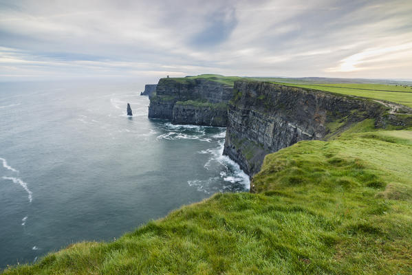 Cliffs of Moher with Breanan Mór rock on the background. Liscannor, Munster, Co.Clare, Ireland, Europe.