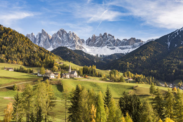 Autumnal landscape with Odle Dolomites peaks on the background. Santa Maddalena, Funes, Bolzano, Trentino Alto Adige - Sudtirol, Italy, Europe.