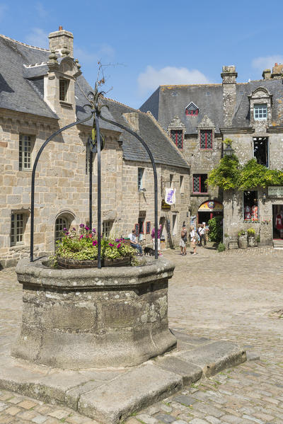 Well in Church square. Locronan, Finistère, Brittany, France.