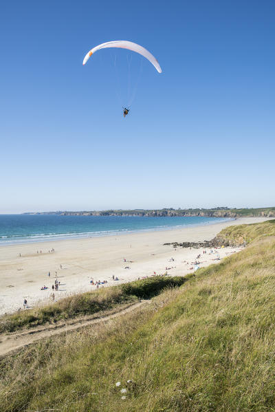 Paragliding above Blancs Sablons beach. Le Conquet, Finistère, Brittany, France.